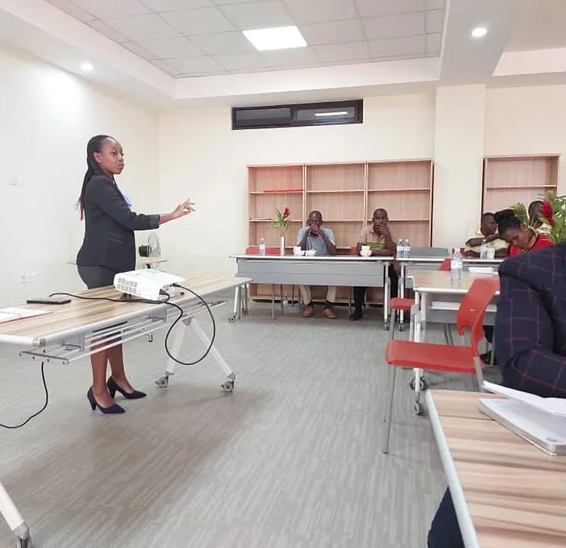 Peninah speaking during a coaching workshop